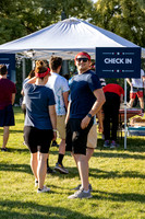Students gather at the upper field for various 4th of July activities.