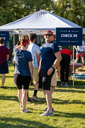 Students gather at the upper field for various 4th of July activities.