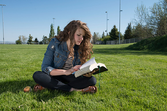 Student models interact and smile for marketing purposes that will be used for the new Campus Housing next to The Ivy.