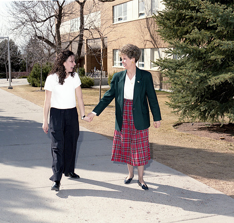 Katherine & Majorie Bennion posing for Women's Week special section cover photo.