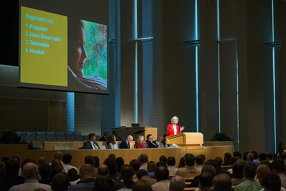 Sister Bonnie Cordon in the General Young Women's Presidency addresses Employees gathered in the Taylor Chapel.