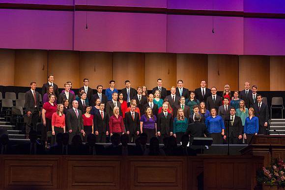 Choir performs musical number during devotional.