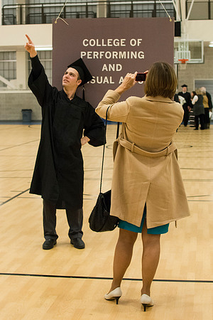BYU-Idaho Graduate poses for Mom's camera