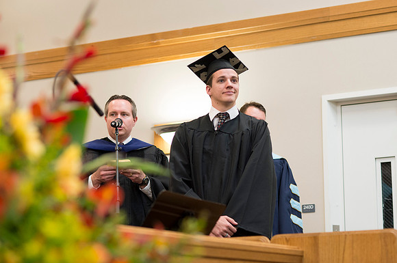 Students of the College of Human Development receive their diploma cover.