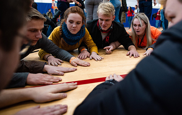 Freshmen students meet their new I-Team groups in the BYU-Idaho Center courts.