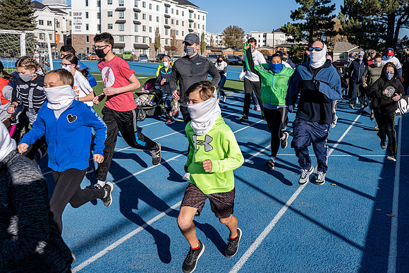 BYU-Idaho employees and their families enjoy a beautiful fall day at the stadium track.