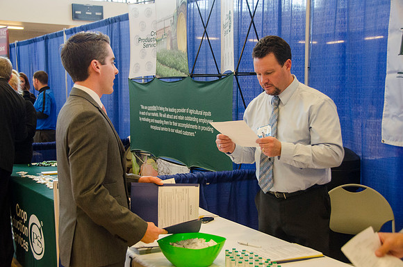 BYU-Idaho students speak to representatives from colleges or companies from their field of study at a career fair held in the I-Center gym