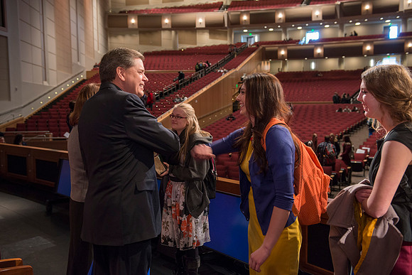 David L. Beck greets students after devotional in the BYU-Idaho Center.