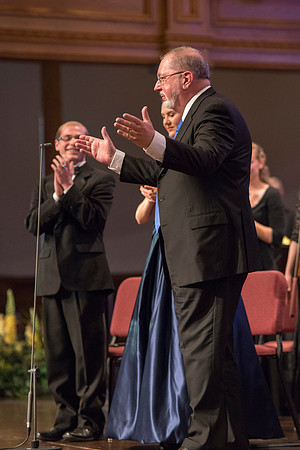 Composer of this years Sacred Music concert, Daniel Gawthrop, makes his bows at the end of the Sacred Music concer held in Temple Square. Photo by Ryan Chase.