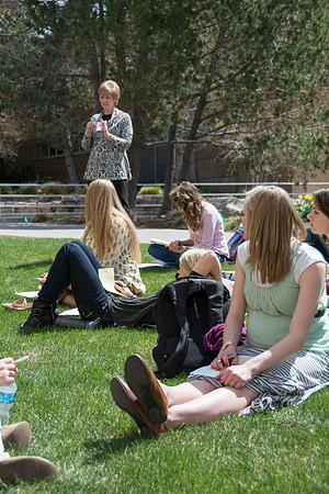 A class meets outside for their first meeting of the spring semester.