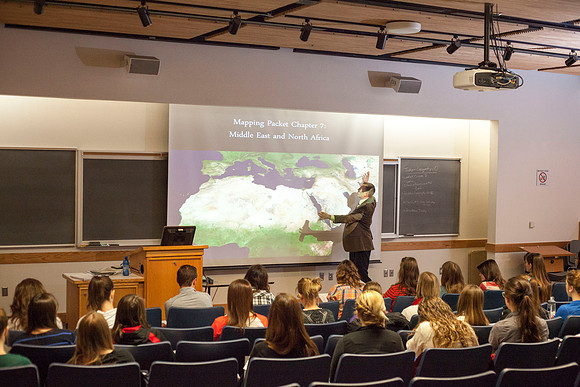 Brother Michael Madsen teaches his early morning Geography For Elementary Teachers class in the Ricks Building.