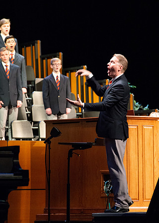 Men choir performing for devotional.