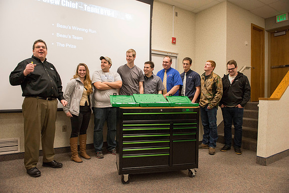 Beau Calderwood received a toolset from SK Tools during a Presentation by Rob Conrad in the Austin Building for beating the Crew Chief at SEMA.