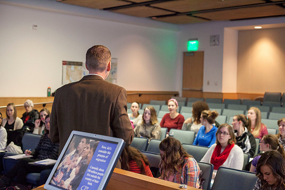 Brother Michael Madsen teaches his early morning Geography For Elementary Teachers class in the Ricks Building.