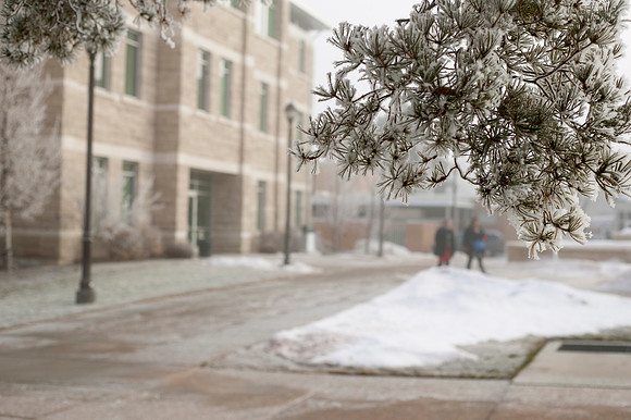 Students leave the Spori Building only to face a cold, foggy morning during the 2015 Winter Semester,