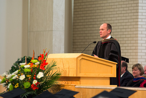 Hank Garrison speaks at the convocation ceremony for the College of Physical Sciences and Engineering held in the Taylor Chapel.