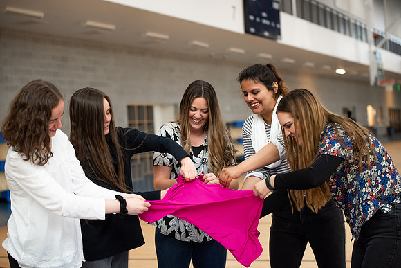 Student Support employees participate in team-building activities in the Hart Gym.