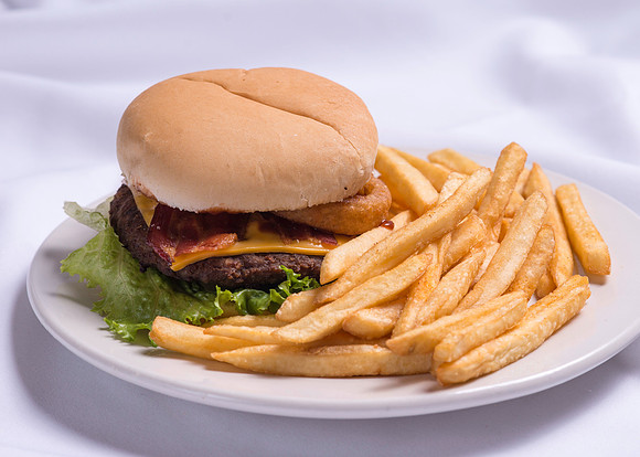 Bacon, Chesse and Onion-Ring Hamburger with Fries.