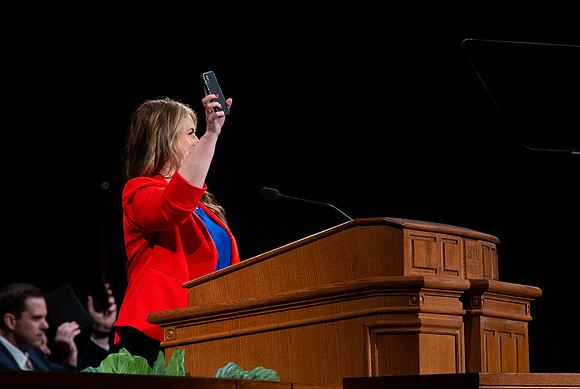 Giving the introduction to Sister Hall.