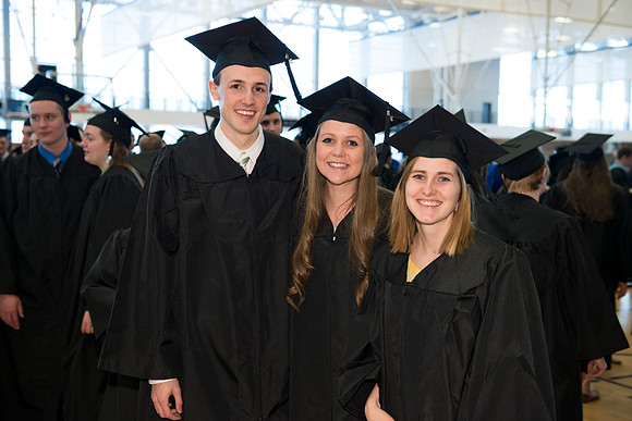 Graduates gather and march in during the processional for April 2014 Graduation ceremonies in the BYU-Idaho Center.