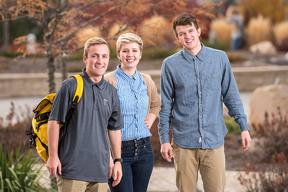 Information Technology students pose on campus for the department webpage.