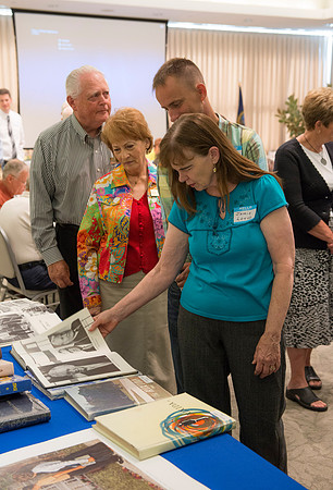 Alumni of the class of 1964 and earlier gather and honor the Briggs for their service.