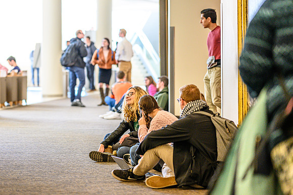 Students gathering in the BYU-Idaho Center, waiting for devtional to start.