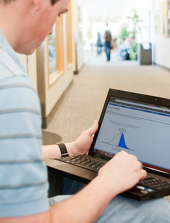 Business Statistic student uses the "Normal Curve Applet" program built by Cit students for the math <br/>department.<br/><br/>News and Notes story: <br/>Title: Math gets a software boost<br