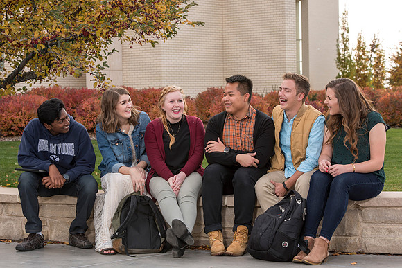 Information Technology students pose on campus for the department webpage.