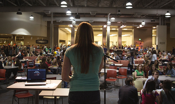 A girl sings karaoke during the BYU-Idaho i-Night Extravaganza.