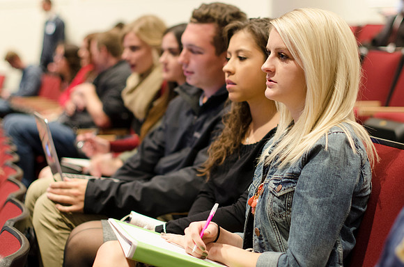 Students listening to devotional.