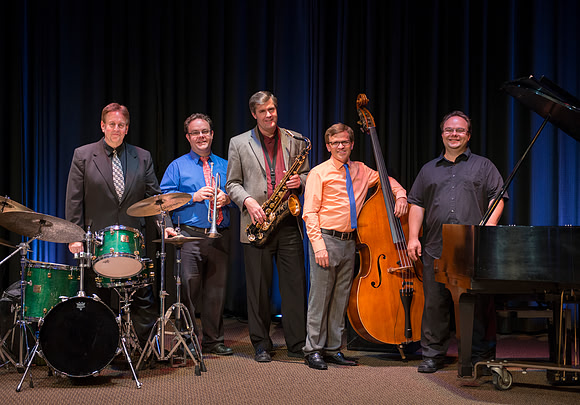 The quintet includes Jay lawrence (drums), Ryan Nielsen (trumpet), Mark Watkins (saxophone), Aaron Miller (bass), and Justin Nielson (piano).