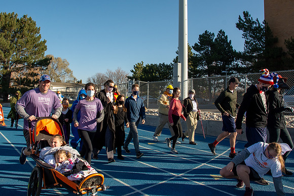 BYU-Idaho employees and their families enjoy a beautiful fall day at the stadium track.