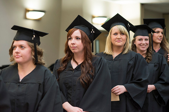 Students of the College of Human Development receive their diploma cover. Photo by Leanna Davidson