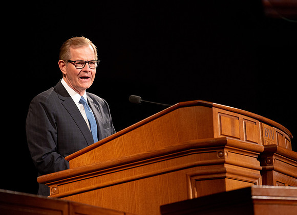Elder Stevenson giving a speech during devotional.