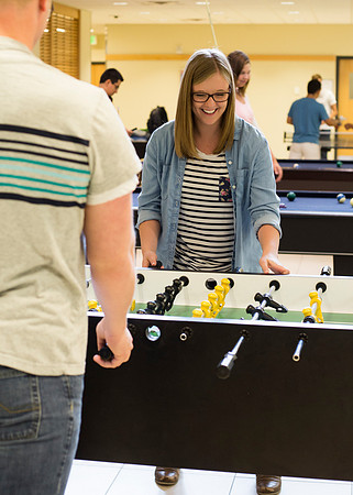 Students playing fuseball between classes.