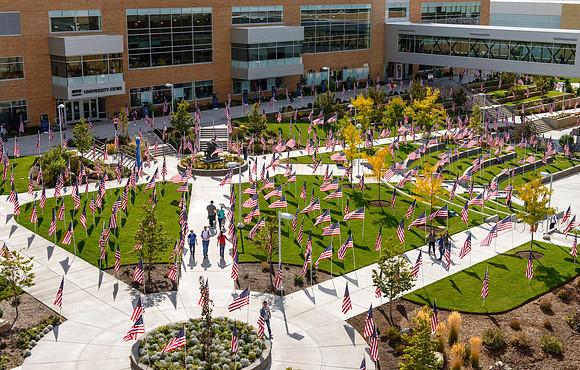 Flags on display in the Central Quad celebrate Constitution Day. "Remembering the brave men and women who gave so much for our Independance and the freedoms we now enjoy."