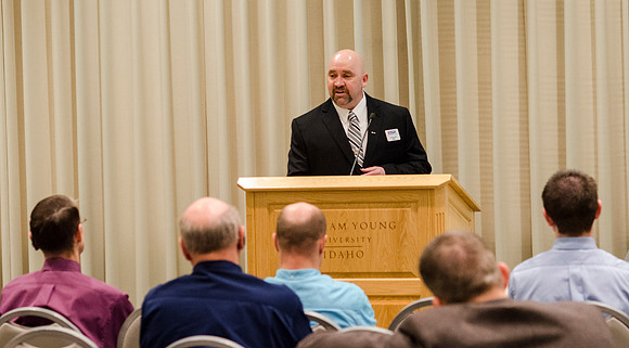 Todd Smith receiving an award on behalf of BYU-Idaho from the Office of the Secretary of Defense for the support BYU-Idaho has given to Peter Stilling while he has been serving in the Guard. Awarded b