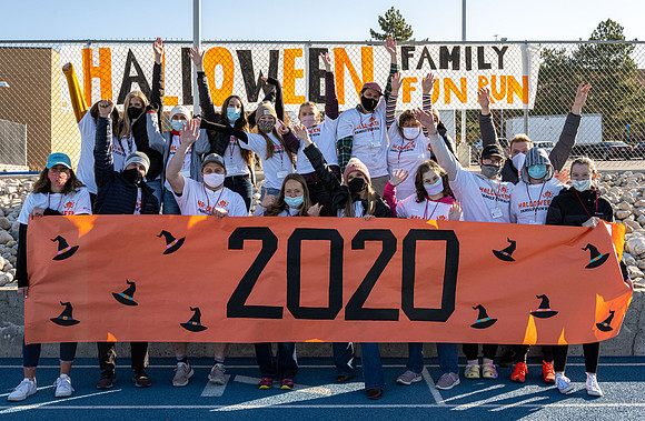 BYU-Idaho employees and their families enjoy a beautiful fall day at the stadium track.