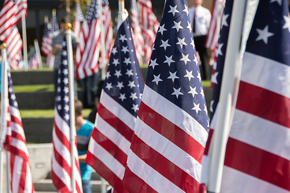 Flags on display in the Central Quad celebrate Constitution Day. "Remembering the brave men and women who gave so much for our Independance and the freedoms we now enjoy."