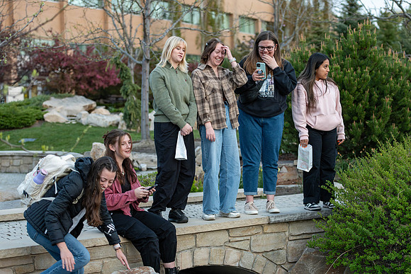 Students gather in the Taylor Quad. The hold paper lanterns, sing, and have fun together.