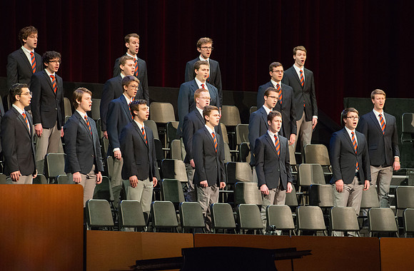 Men choir performing for devotional.