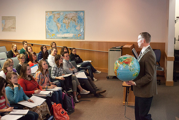 Brother Michael Madsen teaches his early morning Geography For Elementary Teachers class in the Ricks Building.