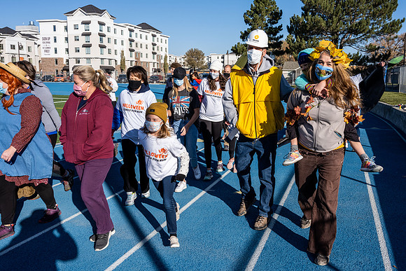 BYU-Idaho employees and their families enjoy a beautiful fall day at the stadium track.